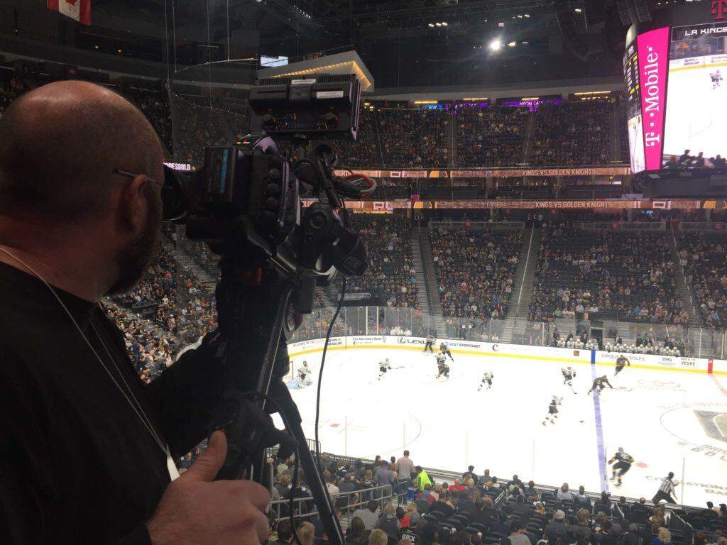 Camera covering hockey match