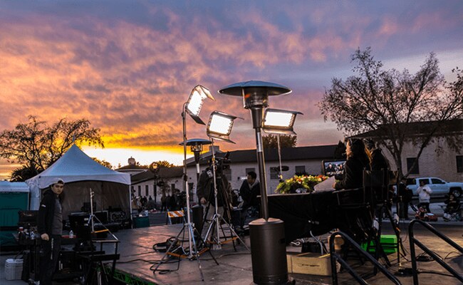 production-assistants-setting-up-shoot