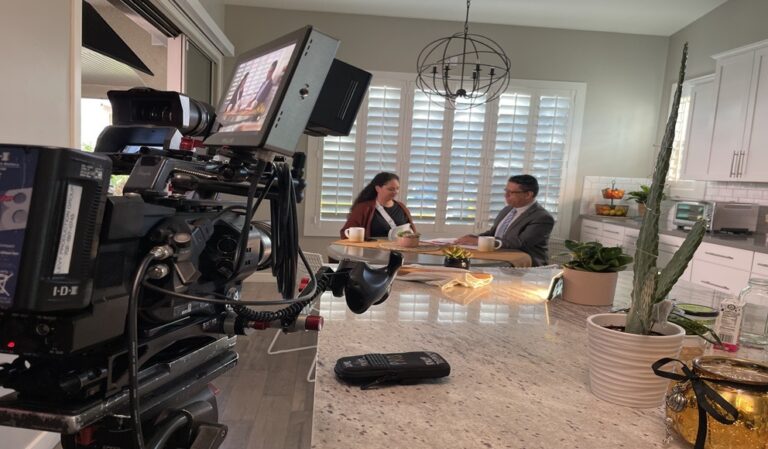 Camera shooting a interview for hospitality business