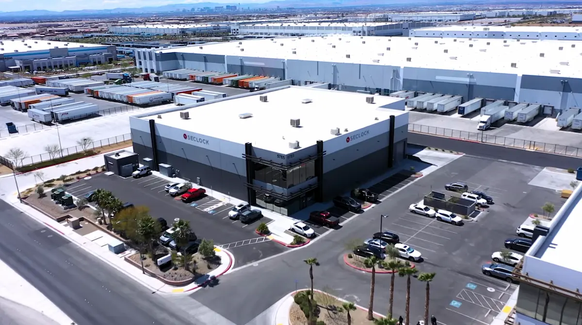 Drone cinematography and dynamic action-camera footage showcased the scale and operational capabilities of SECLOCK’s West Coast warehouse.
